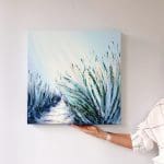 Large coastal inspired oil painting on deep edged canvas. Sand dunes and marram grasses leading to the sea with evening sunlight coming through. Blue, aqua and sandy colours and textures.